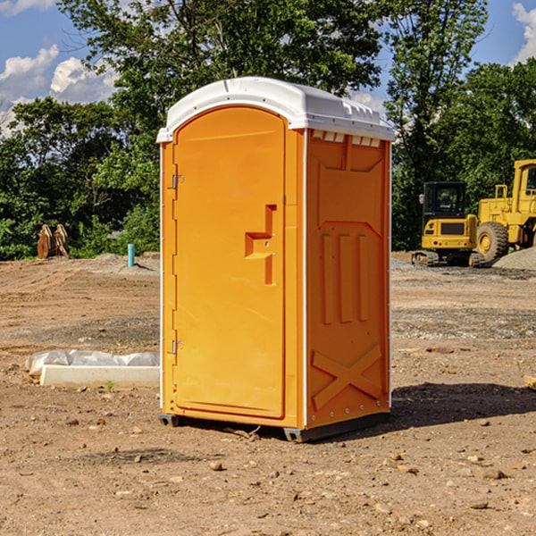 how often are the portable restrooms cleaned and serviced during a rental period in Como